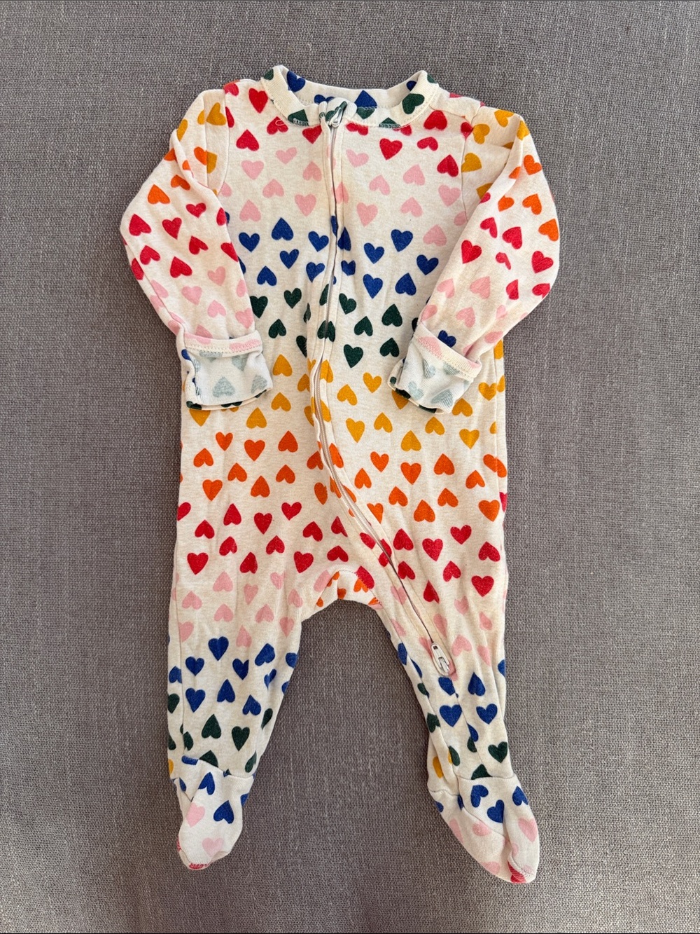 Old Navy Baby Rainbow Heart Footed pajamas. 3-6 mos